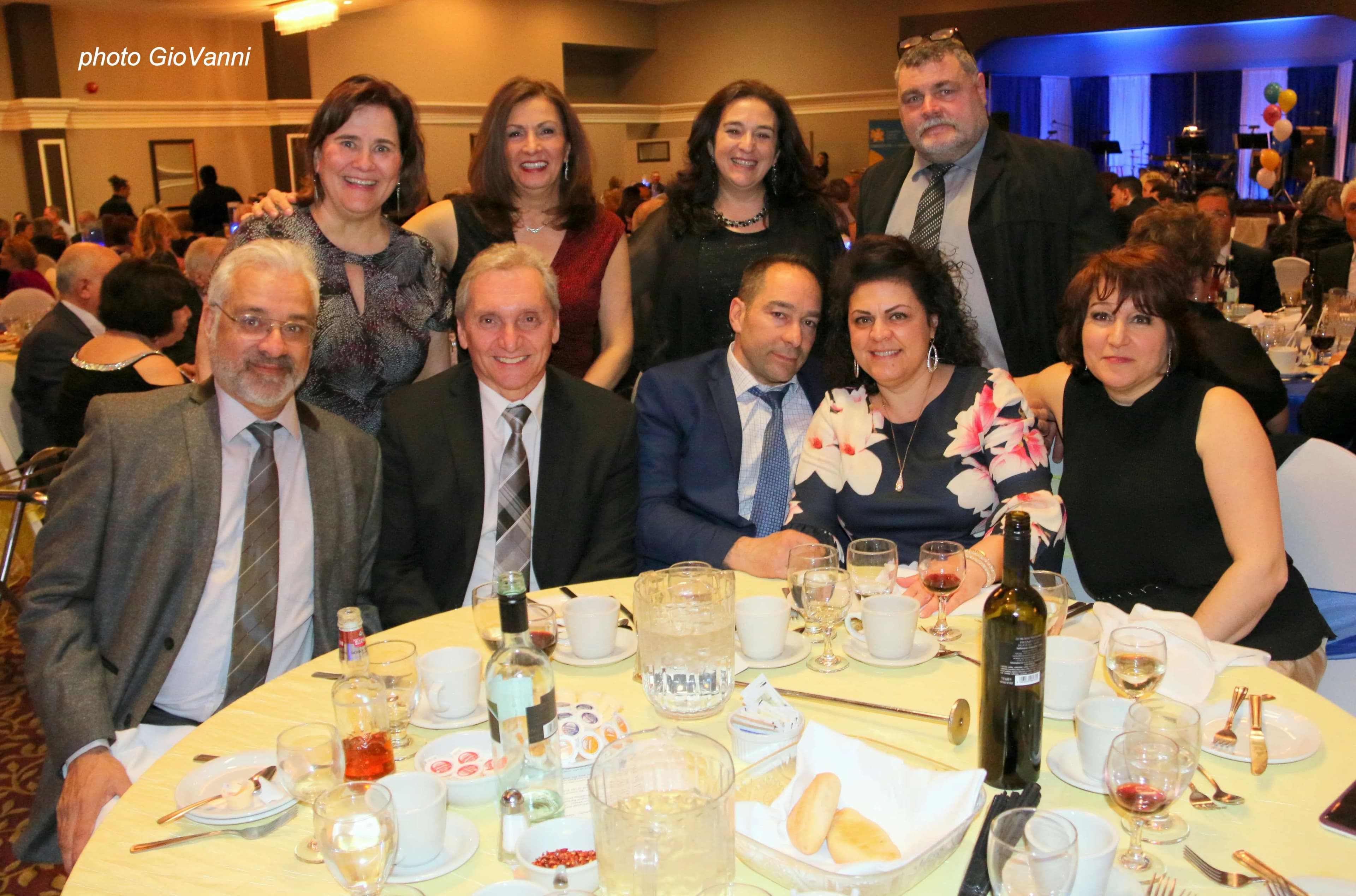 Group of attendees at gala dinner table